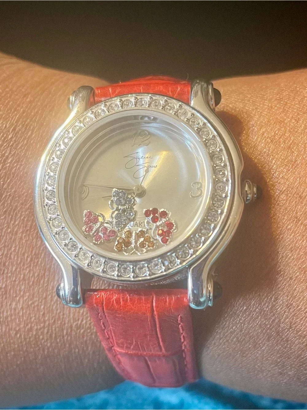 Suzanne Somers Watch with Floating 4 Rhinestone Butterflies. Red Leather Band